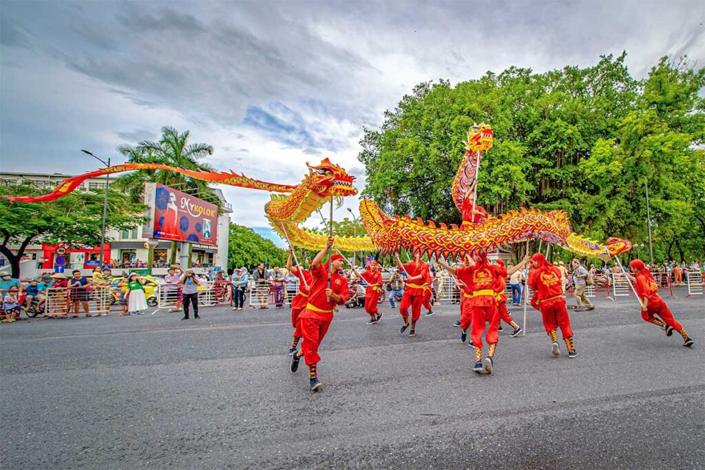 A dragon dance on the street during Hue Festival