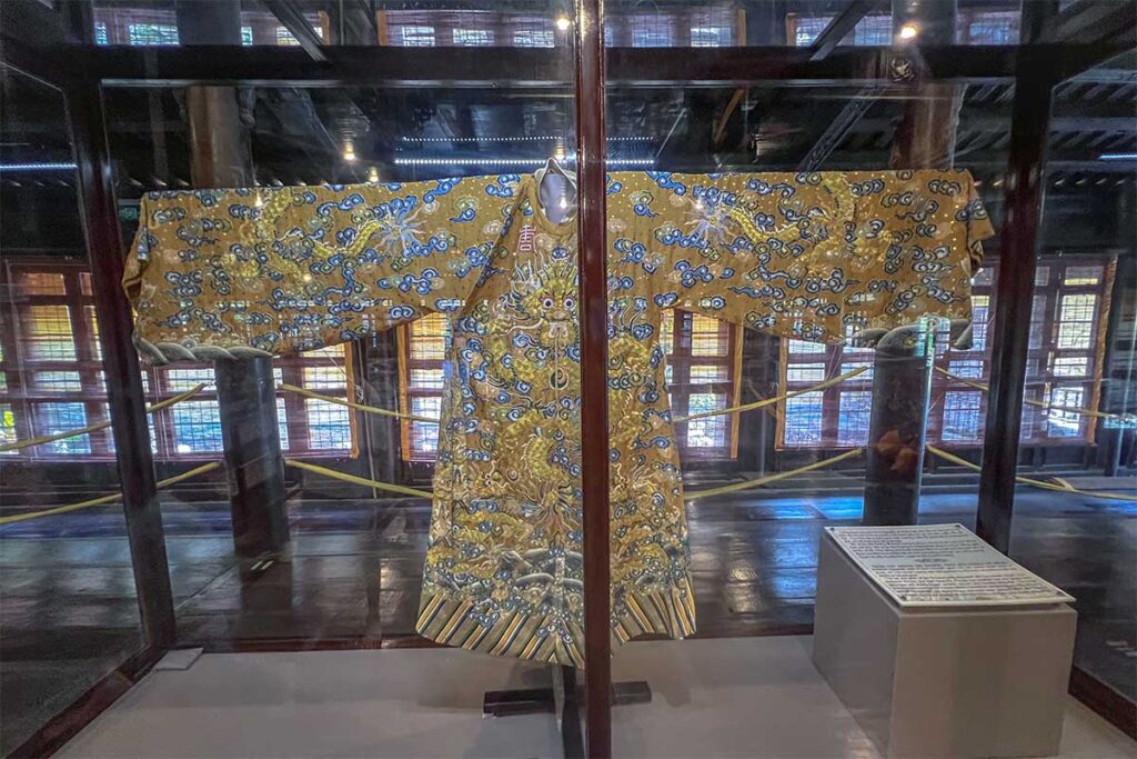 A Nguyen Dynasty costume in a glass display inside Hue Museum of Royal Antiquities