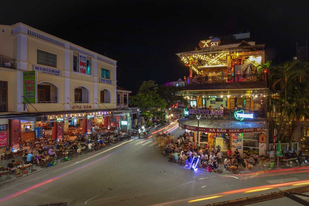 Bars full of people during nightlife in Hue