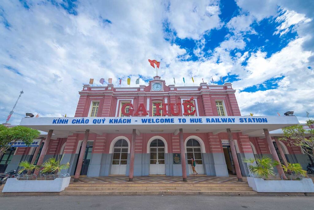 The exterior of Hue Railway Station with a large sign saying "Ga Hue"