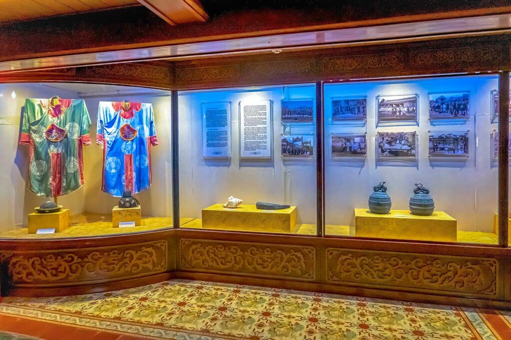 A small exhibition with traditional clothes and performance objects inside Hue Duyet Thi Duong Theater