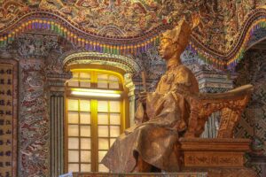 Closeup view of statue of Emperor Khai Dinh in his tomb in Hue