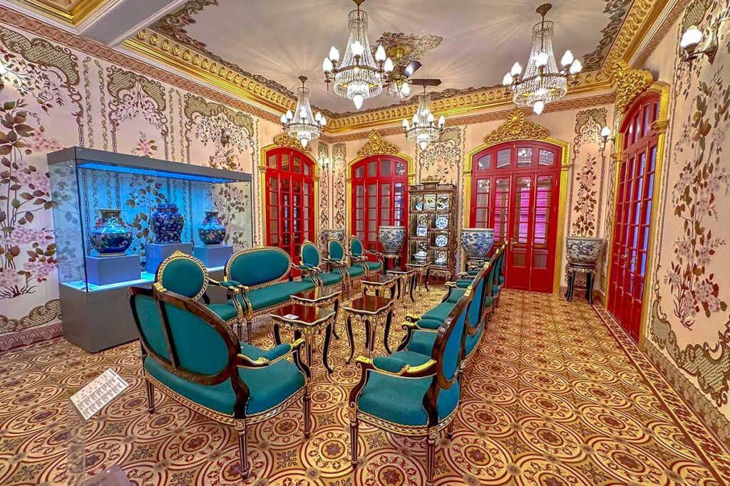 A beautiful room with dining chairs inside the Kien Trung Palace
