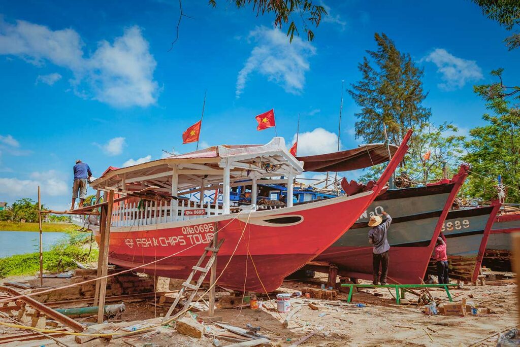 Wooden boats under construction at Kim Bong Carpentry Village boatyard near Hoi An.
