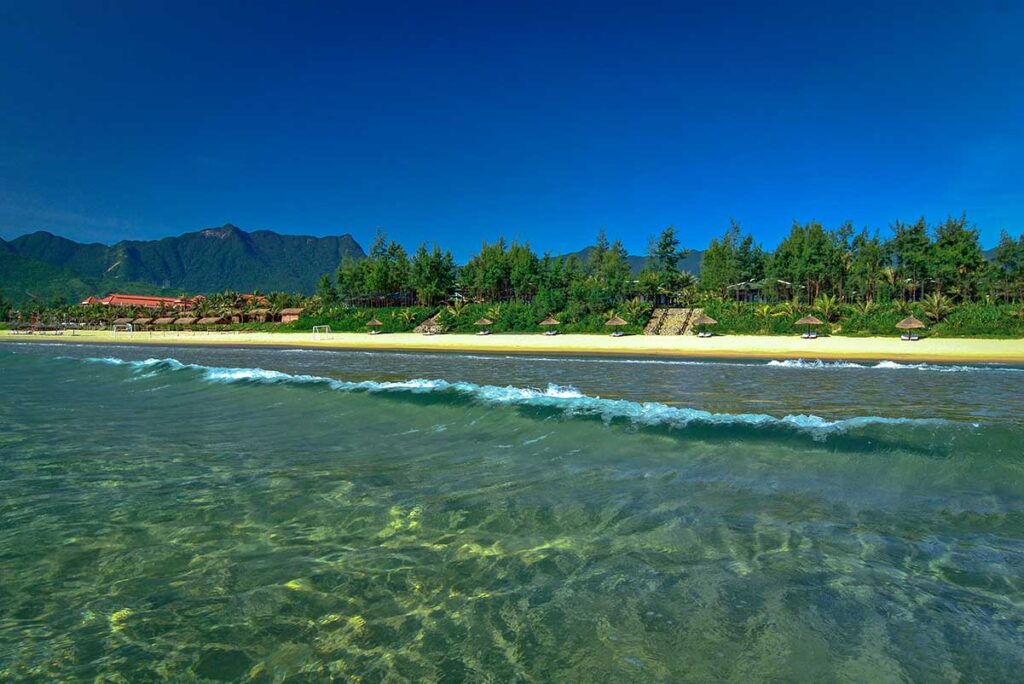 Clear water and small waves at the quiet Lang Co Beach