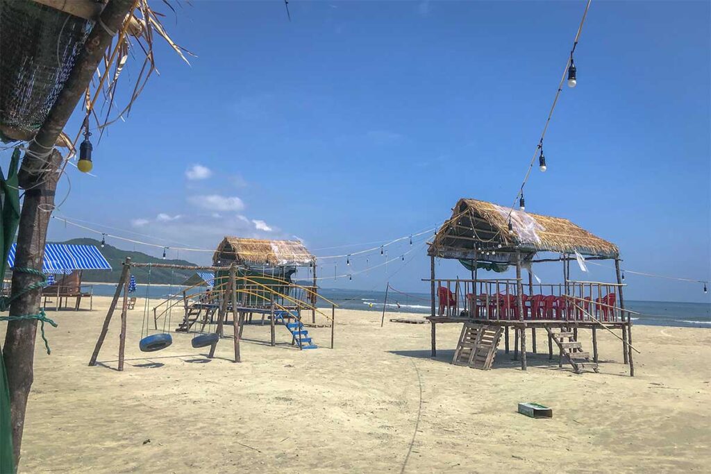 A few wooden stilt sitting places on Loc Binh Beach in Hue
