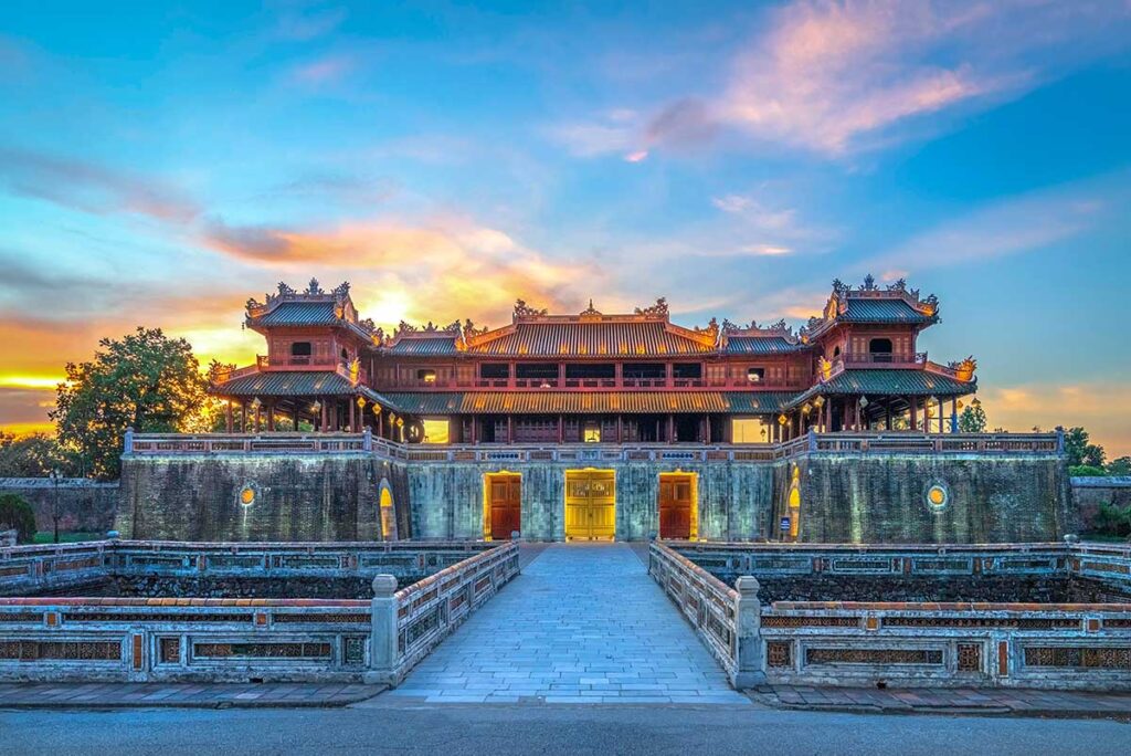 The Ngo Mon Gate of Hue Imperial City seen in the late afternoon when the sun is setting down behind the gate