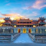 The Ngo Mon Gate of Hue Imperial City seen in the late afternoon when the sun is setting down behind the gate