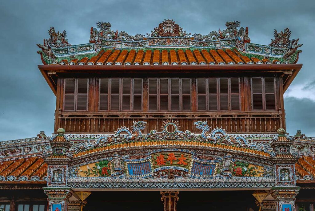 A closeup of Thai Binh Pavilion with mosaic elements on the outside