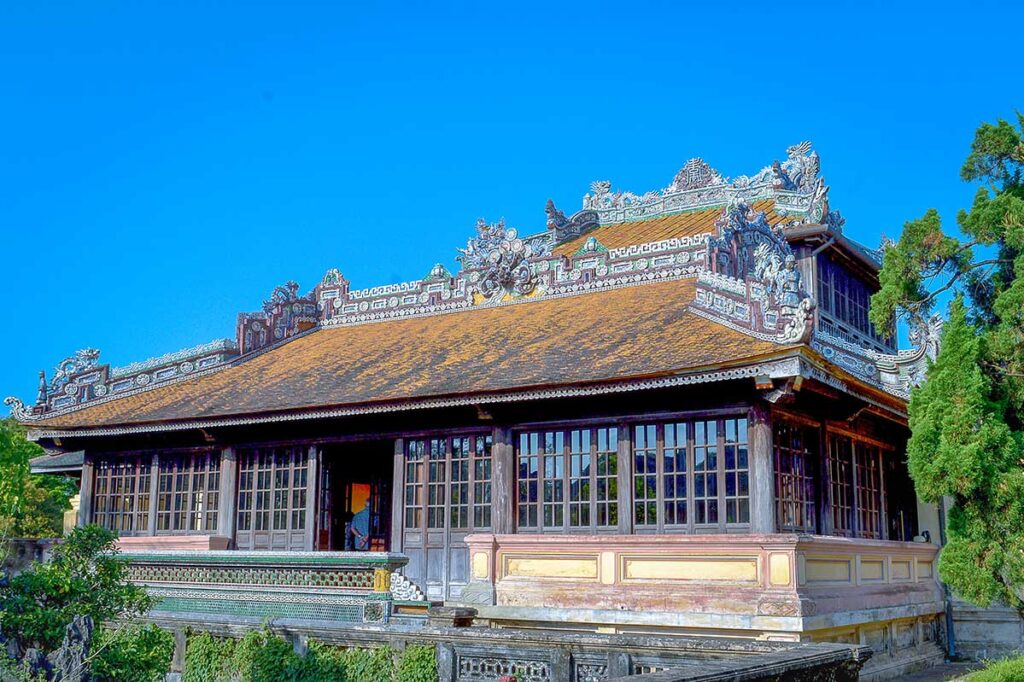 The back of Thai Binh Pavilion with the edge of a pond