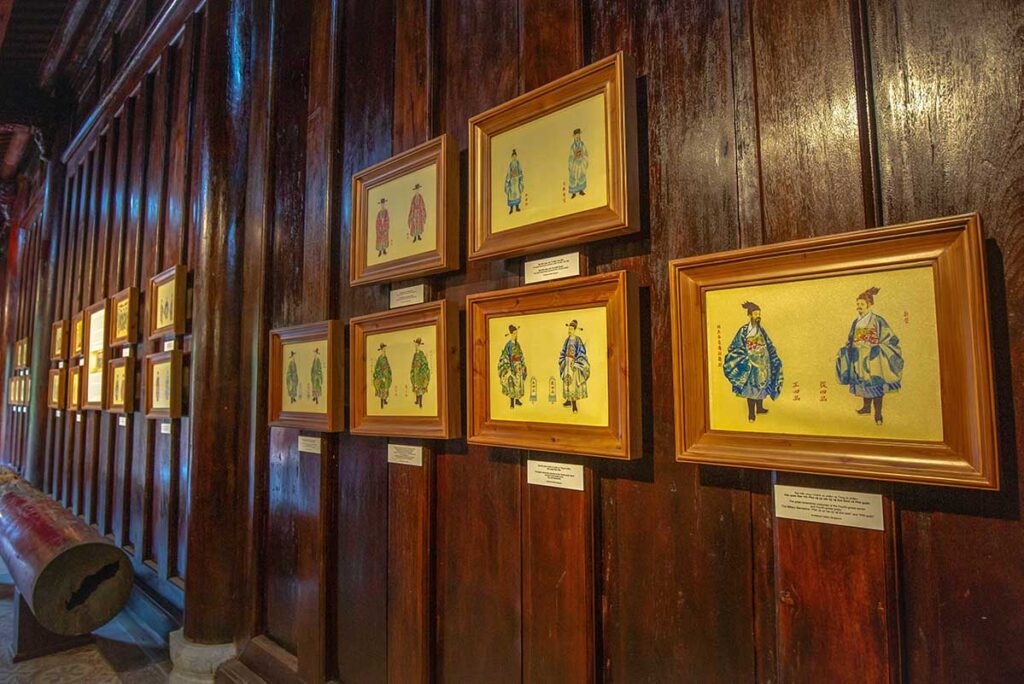 On the wall of Thai Hoa Palace pictures of traditional clothing