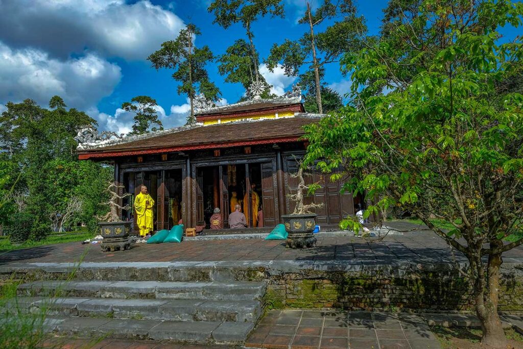 Monks in a small side building part of Thien Mu Pagoda
