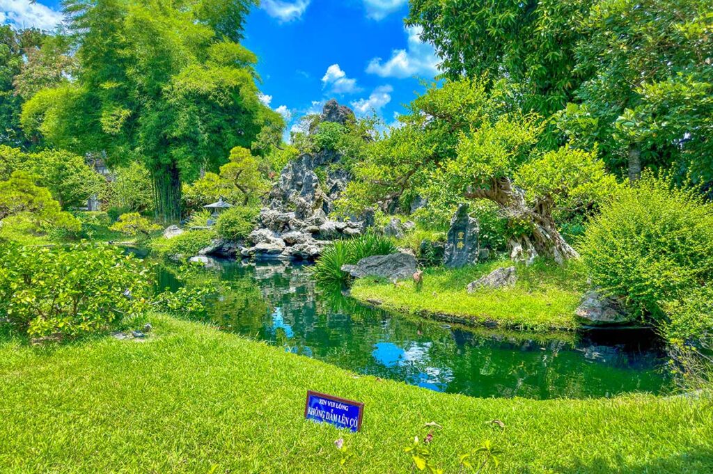A green garden area of Thien Mu Pagoda