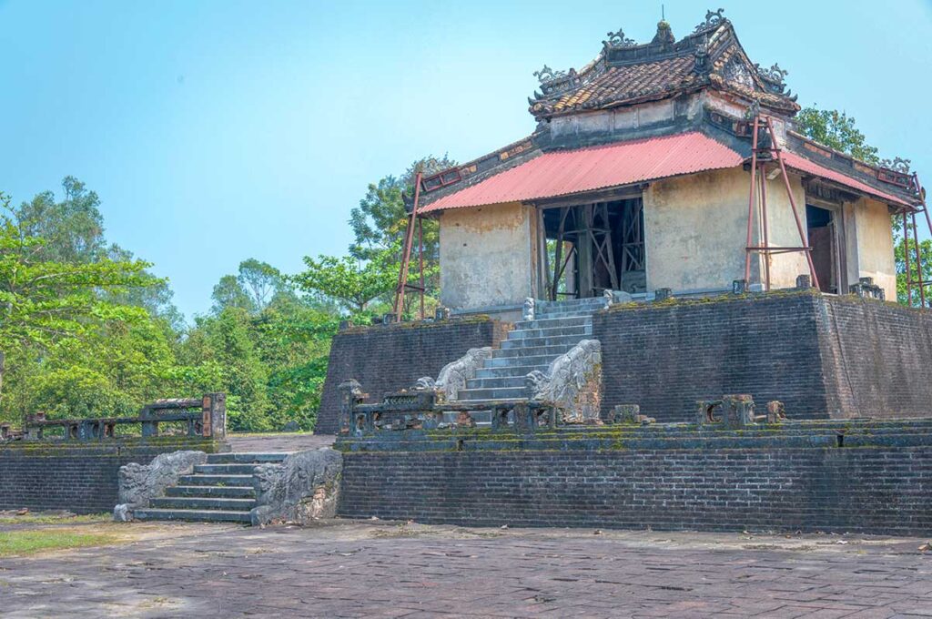 The Stele Pavilion (Bi Dinh) standing on a higher level with stairs leading on all sides