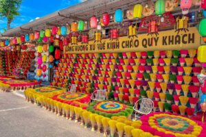 A wall of incense at a store in the street of Thuy Xuan Incense Village in Hue