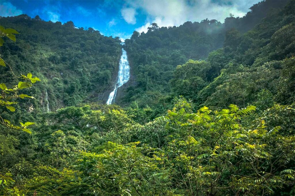 The 9-Storey White Waterfall in the distance reached by trekking in Meo Vac