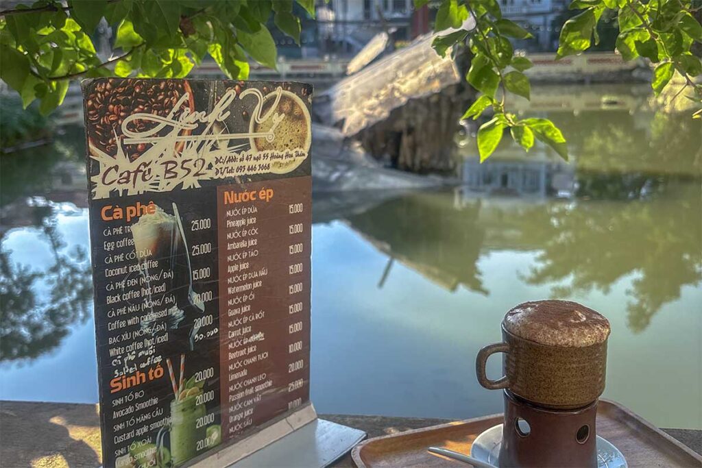A coffee with display with the menu of a cafe right by B52 Lake