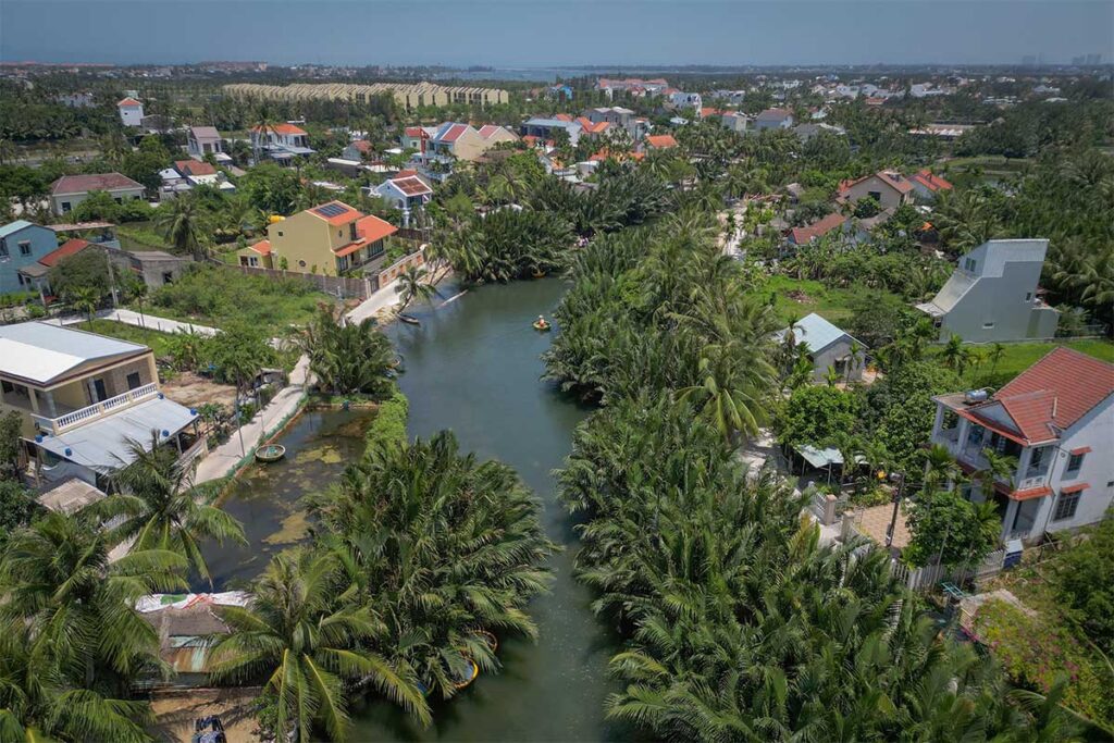 Aerial view of Cam Thanh Coconut Village showing lush palm canals and small waterways – one of the best eco villages around Hoi An.