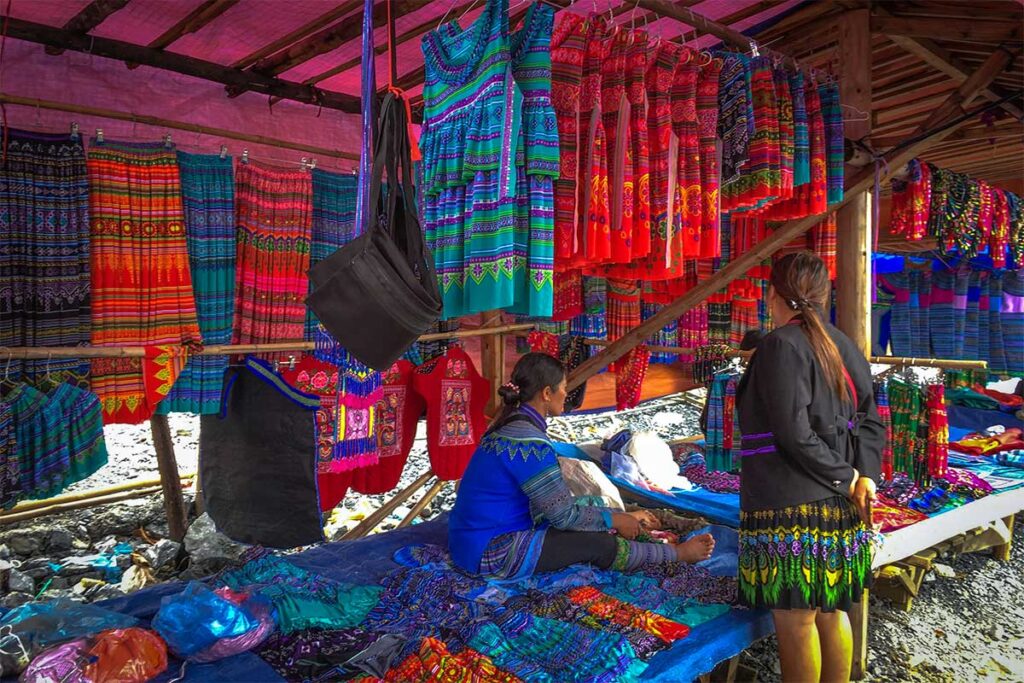 Ethnic clothes being sold at a stall at the Cao Son Market
