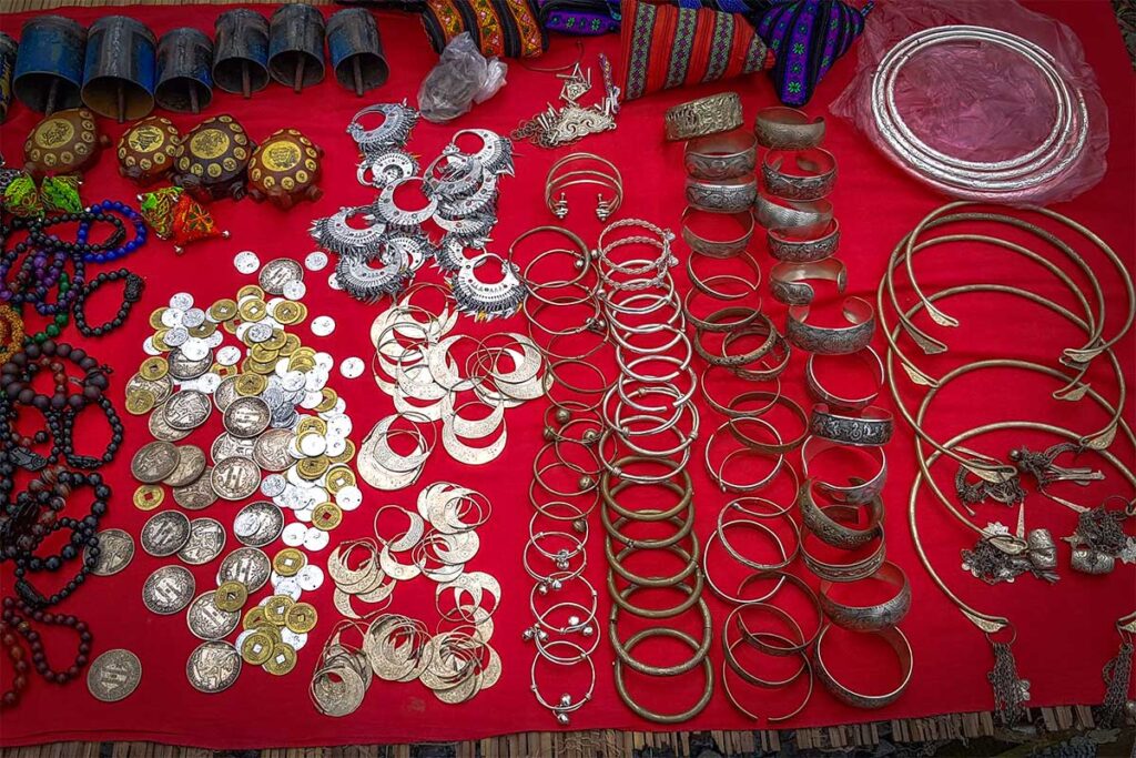 Silver jewelry being displayed to sell at the Cao Son Market