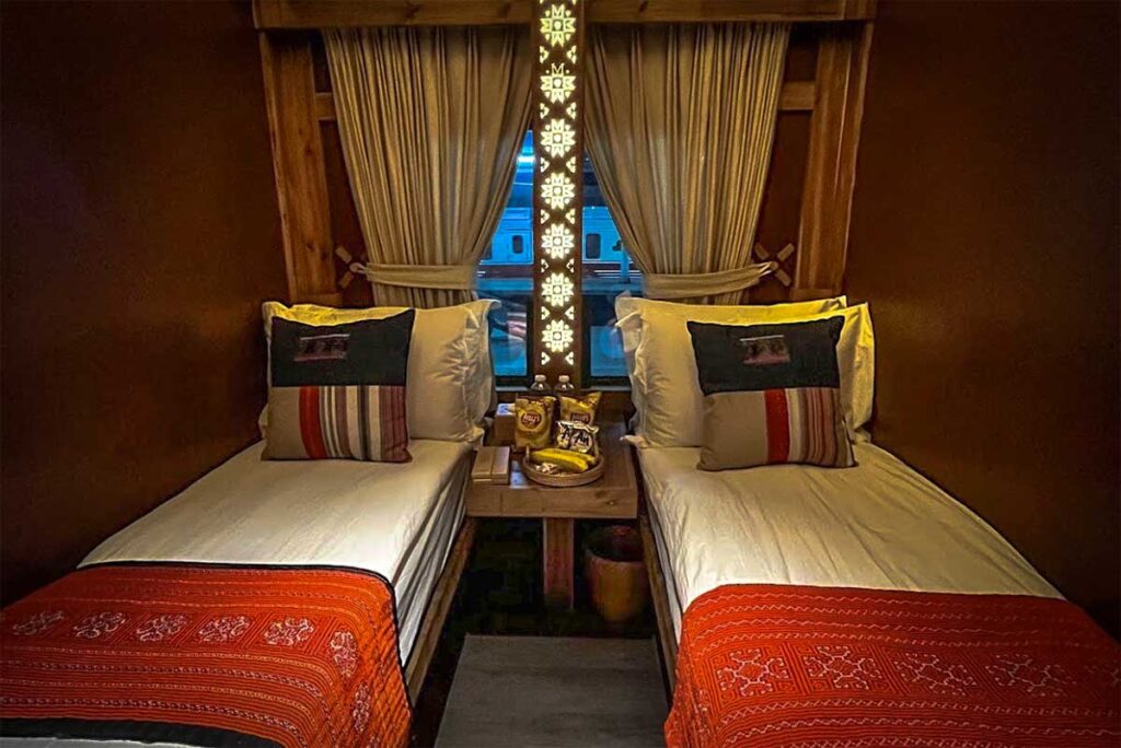 Luxury and nicely decorated twin room cabin inside the tourist train compartment of Chapa Express from Hanoi to Sapa