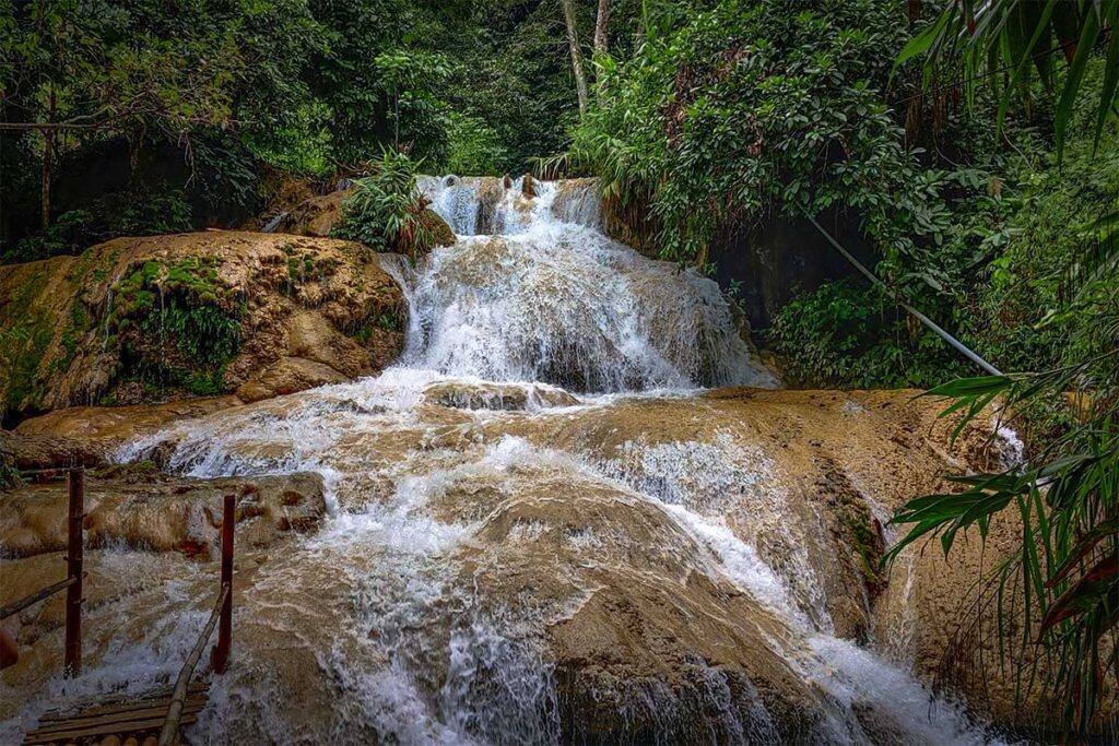 Stream of the Hieu Waterfall surrounded by forest 