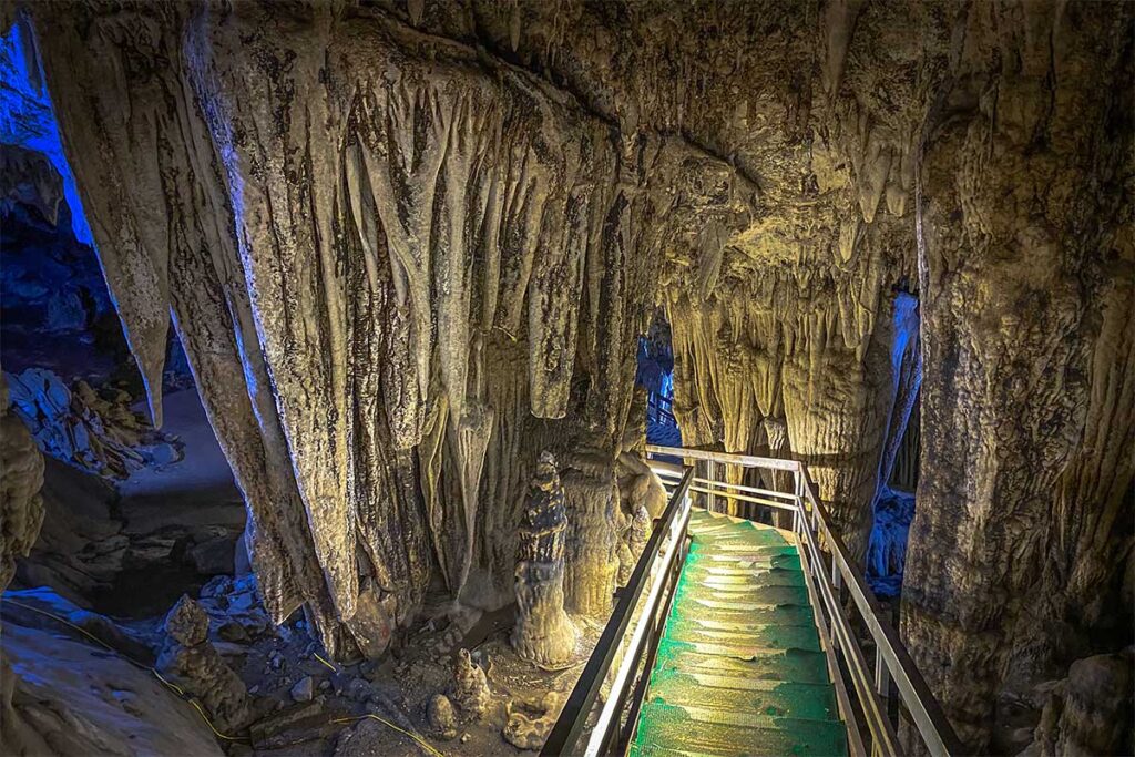 Metal walking paths through Lung Khuy Cave in Ha Giang