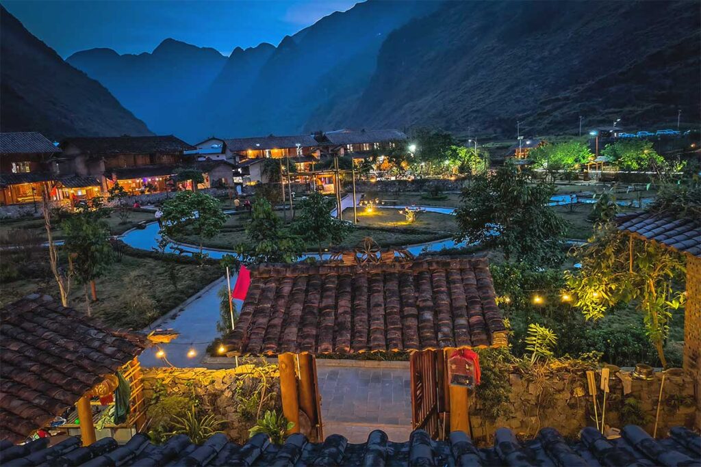  Pa Vi Hmong Village at night time with lights lighting up the homestays