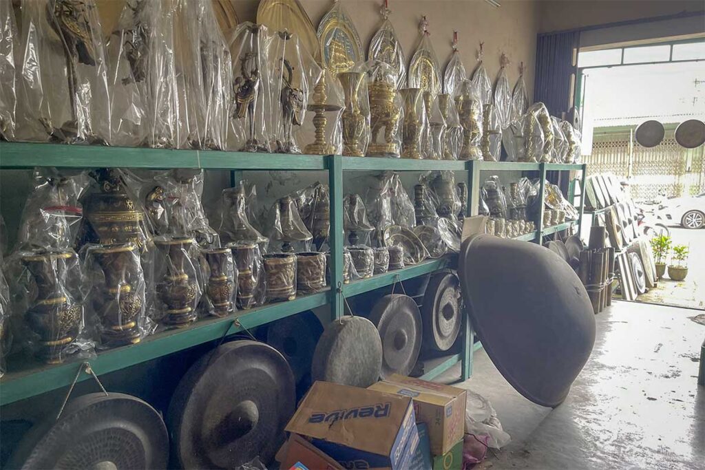 Bronze gongs, vases, and ritual instruments for sale at Phuoc Kieu Bronze Casting Village, Hoi An.