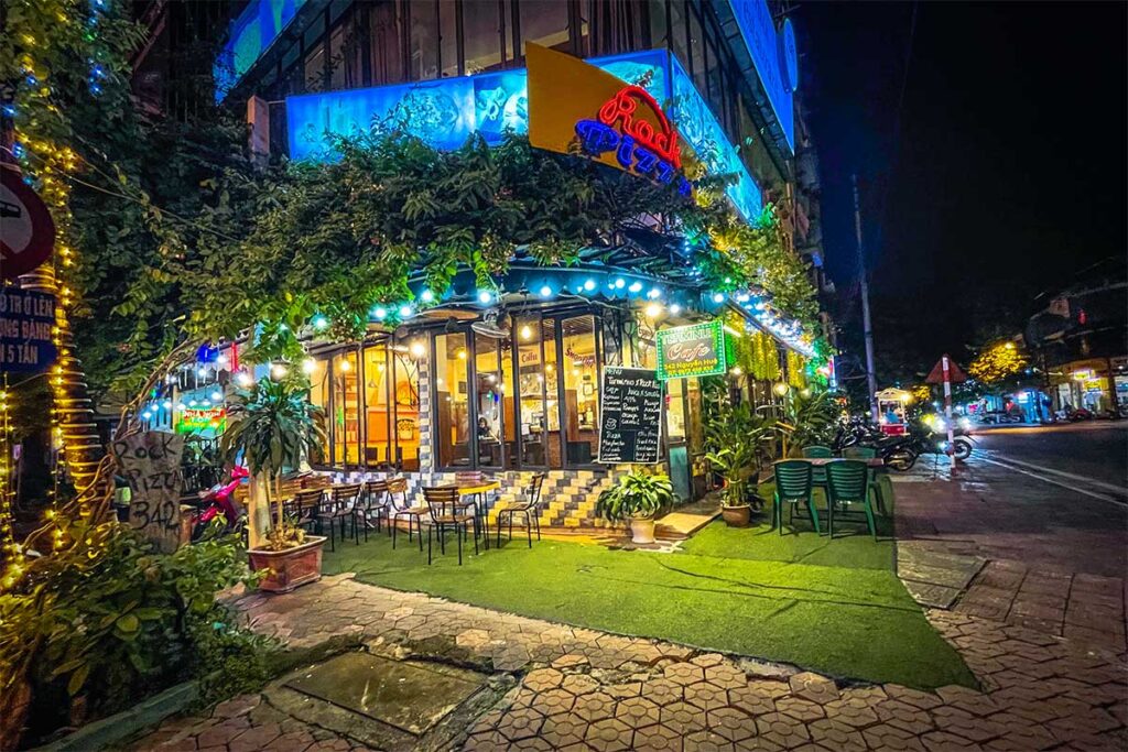 The exterior of Rock Pizza Lào Cai across the street from the train station