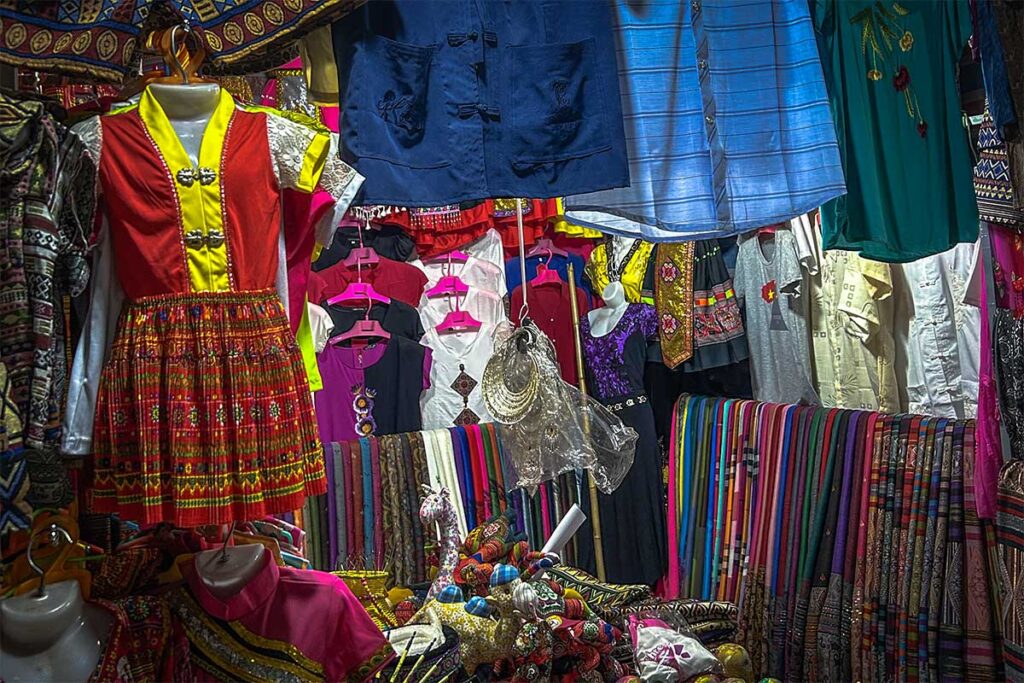 Ethnic clothes being sold at a stall inside the Sapa Central Market building