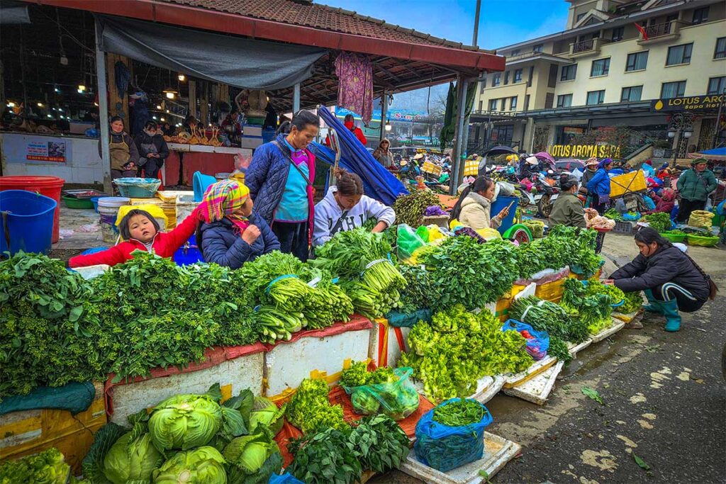 Vegetables being sold at a stall outside at the Sapa Market