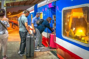 Tourists boarding the train from Hanoi to Sapa at the compartment of Sapaly Express