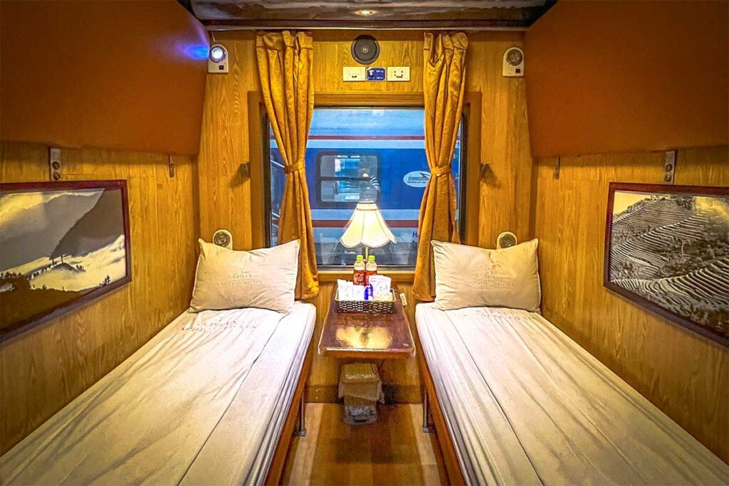Interior of 2-berth (twin) cabin of the tourist train Sapaly Express that drives from Hanoi to Sapa