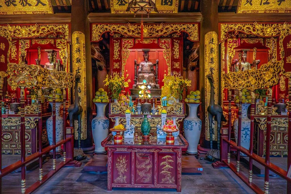 An altar with statue of Le Thanh Tong inside the Temple of Literature in Hanoi