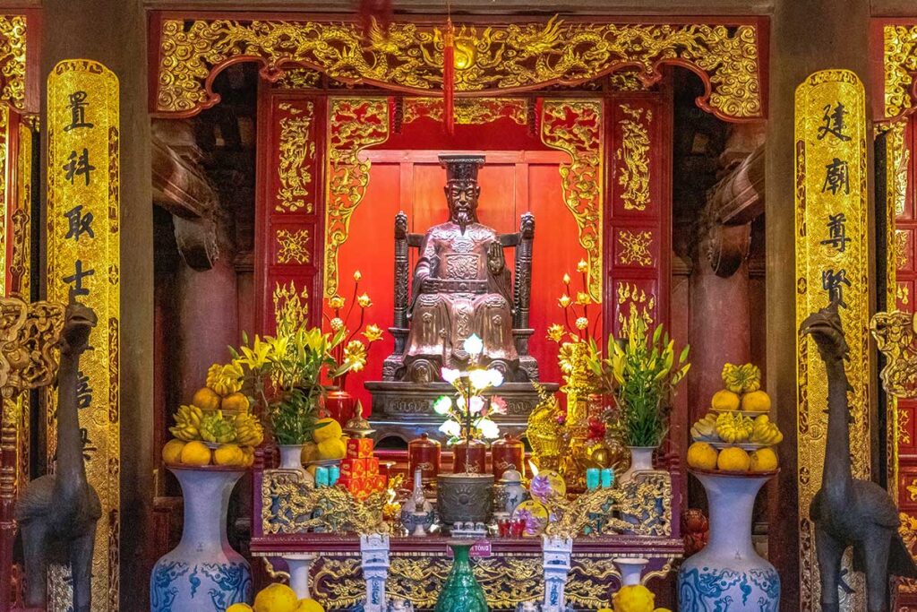 An altar with statue of Le Thanh Tong inside the Temple of Literature in Hanoi