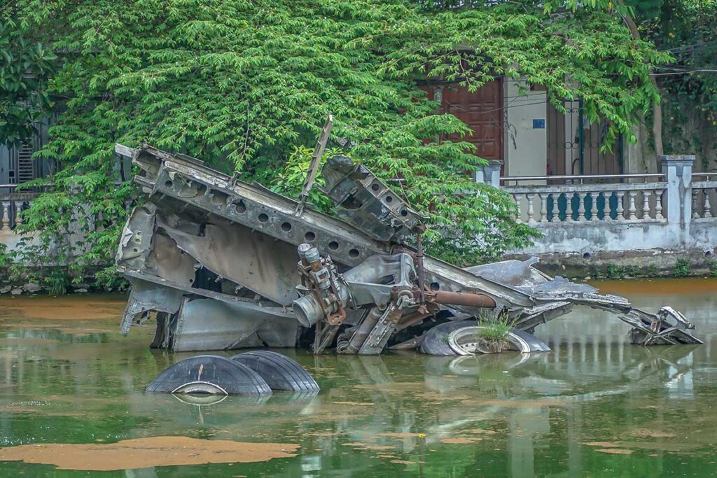 A closeup view of the wreckage of a B-52 bomber plane inside B-52 Lake in Hanoi