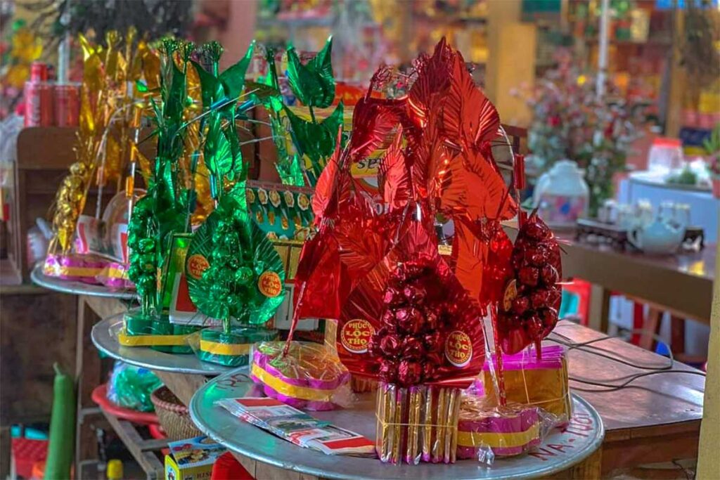 A closeup view of a joss paper gift that is being sold at Ba Chua Kho Temple