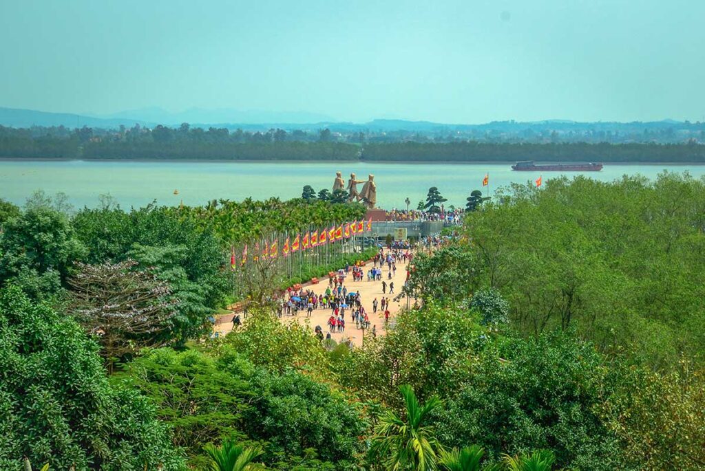 Bac Dang River at the historical sight with in the distance the statue of  Ngo Quyen, Le Dai Hanh and Tran Hung Dao