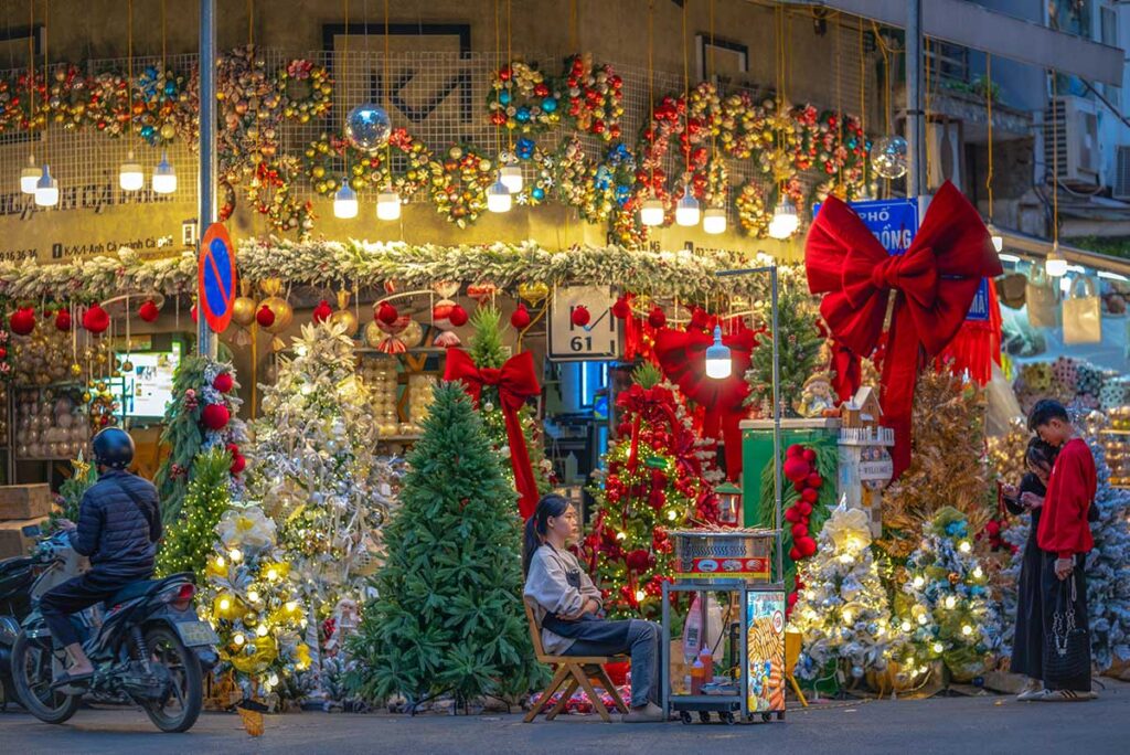 Christmas in Hanoi - Christmas trees and decorations being sold on Hang Ma Street in the Old Quarter