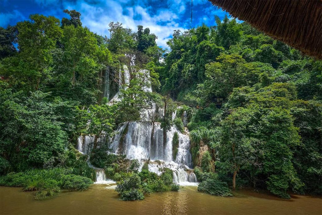 The stunning Dai Yem Waterfall surrounded by green jungle