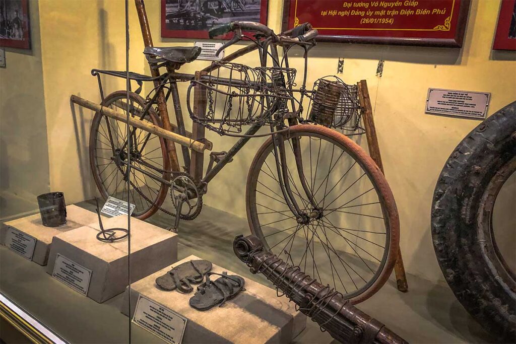 Personal items, including a bicycle and sandals of Vietnamese soldiers used in the Battle of Dien Bien Phu displayed in Dien Bien Phu Victory Museum 