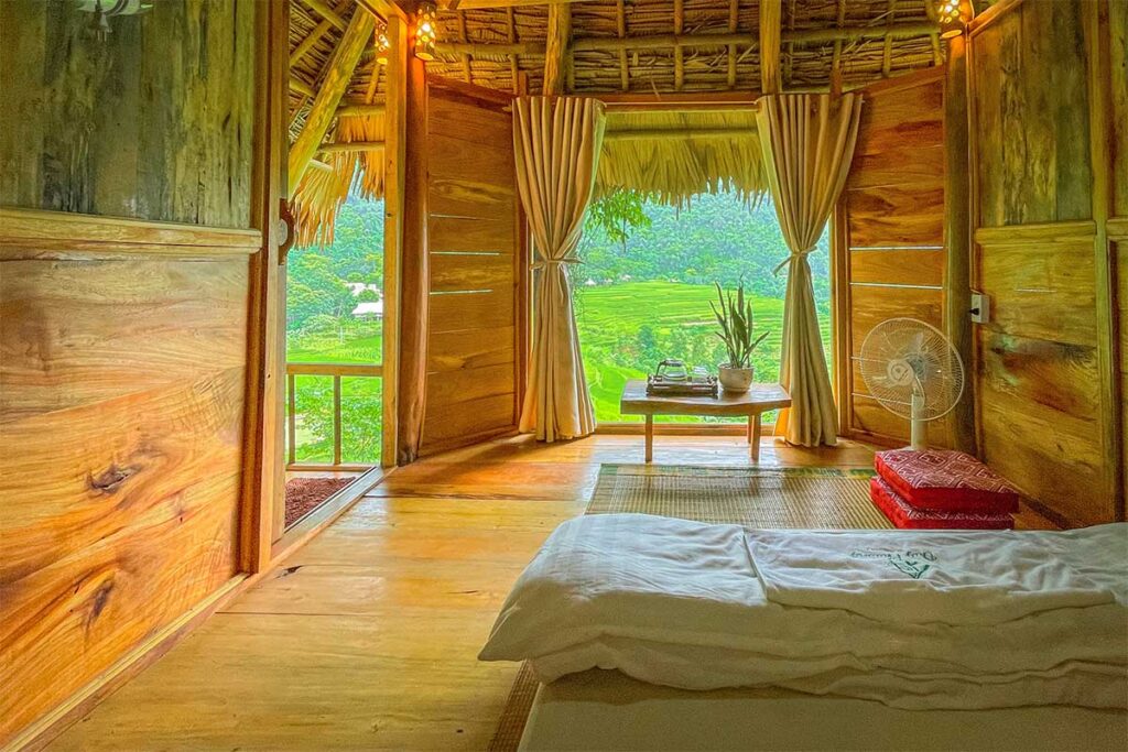A simple but nice room of Duy Phuong Homestay in Hieu Village with views over terraced rice fields