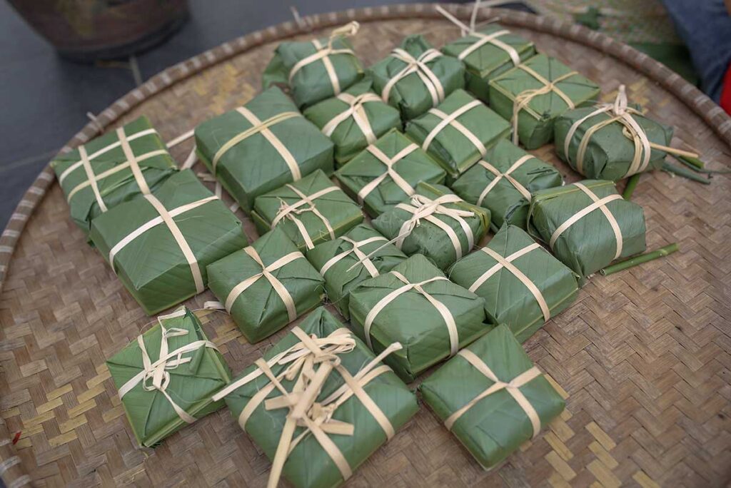 Green Bean Cakes (Bánh Đậu Xanh) packed in banana leaves sold in Hanoi