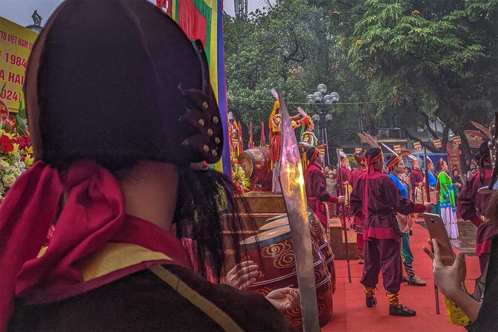 People dressed up in traditional clothes of historic times commemorating the Trung Sisters at Hai Ba Trung Temple Festival