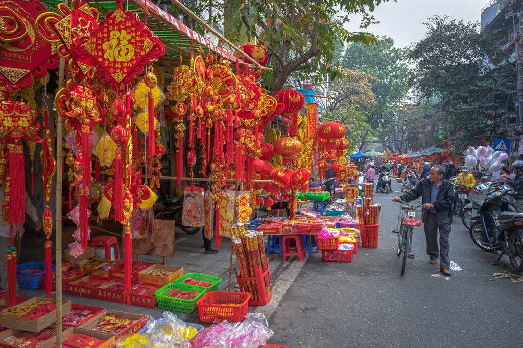 Hang Ma street during Tet New year full of red decorations being sold