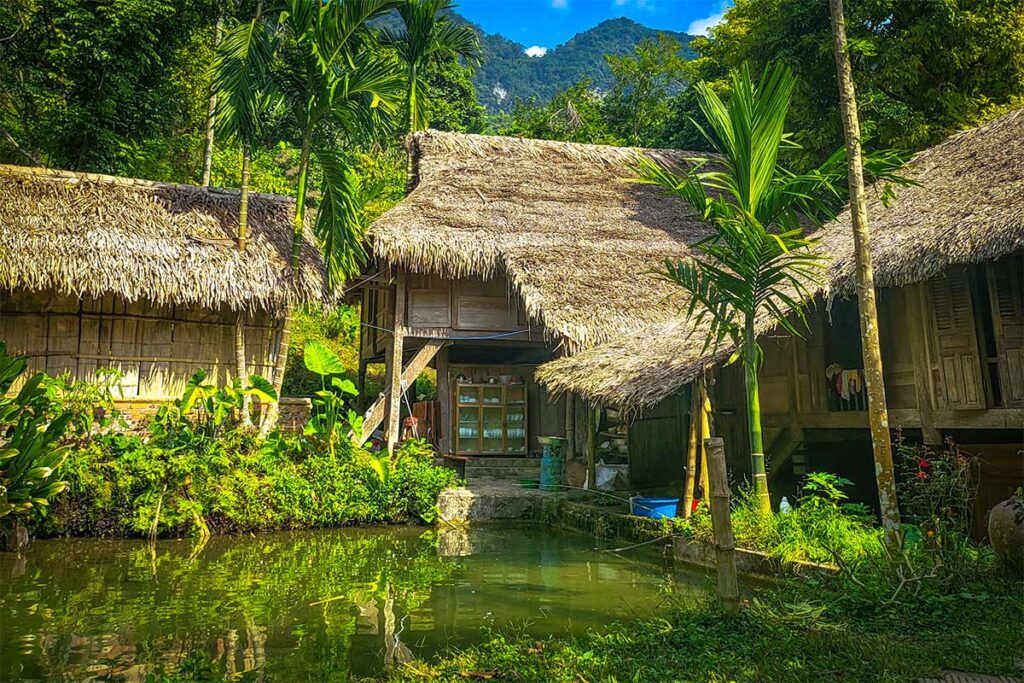 Traditional houses made of wood, bamboo and palm leaves of Hieu Village in Pu Luong