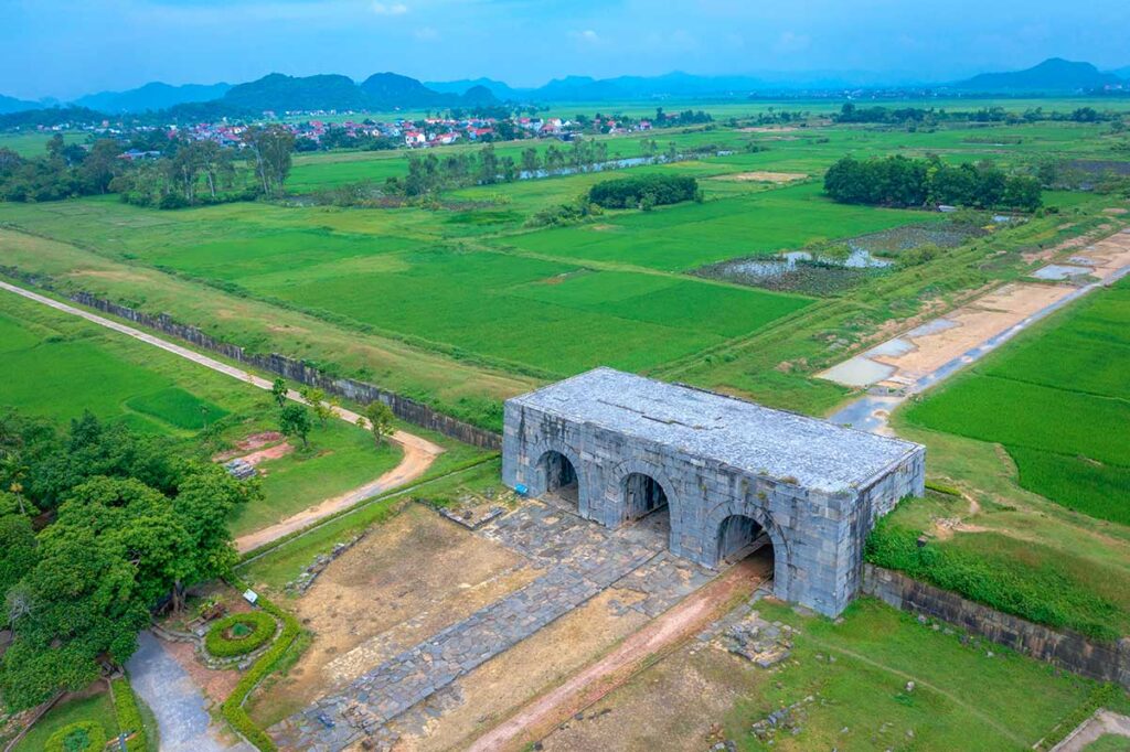 Aerial view of the main gate of Citadel of the Ho Dynasty surounded with rice fields