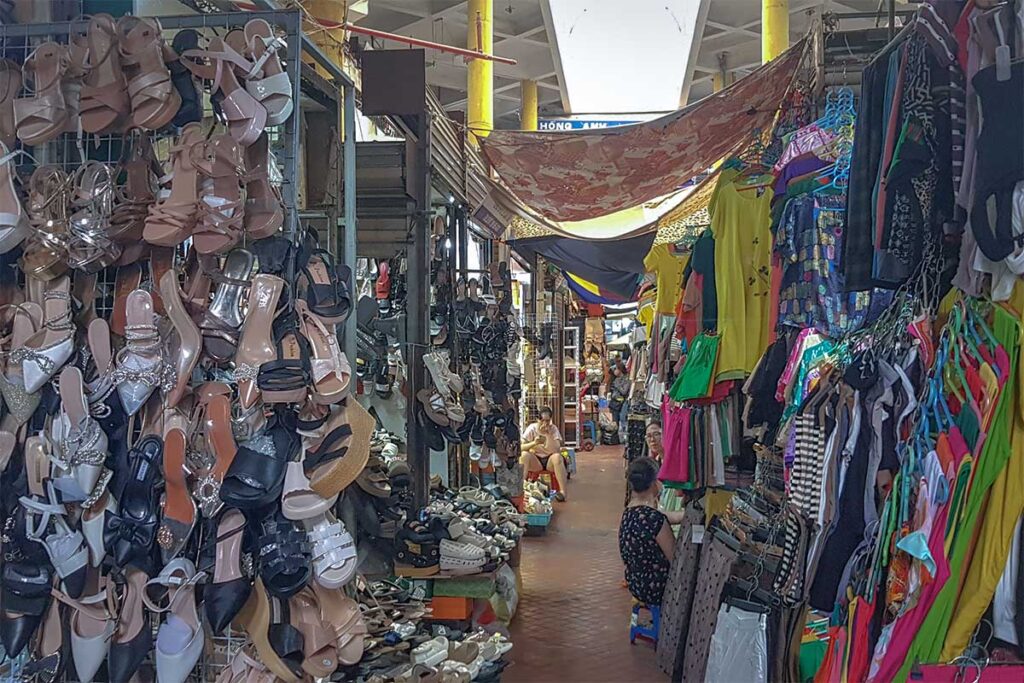 One of the narrow alleys in the upstairs sections of the Hom Market with silk, shoes and clothes