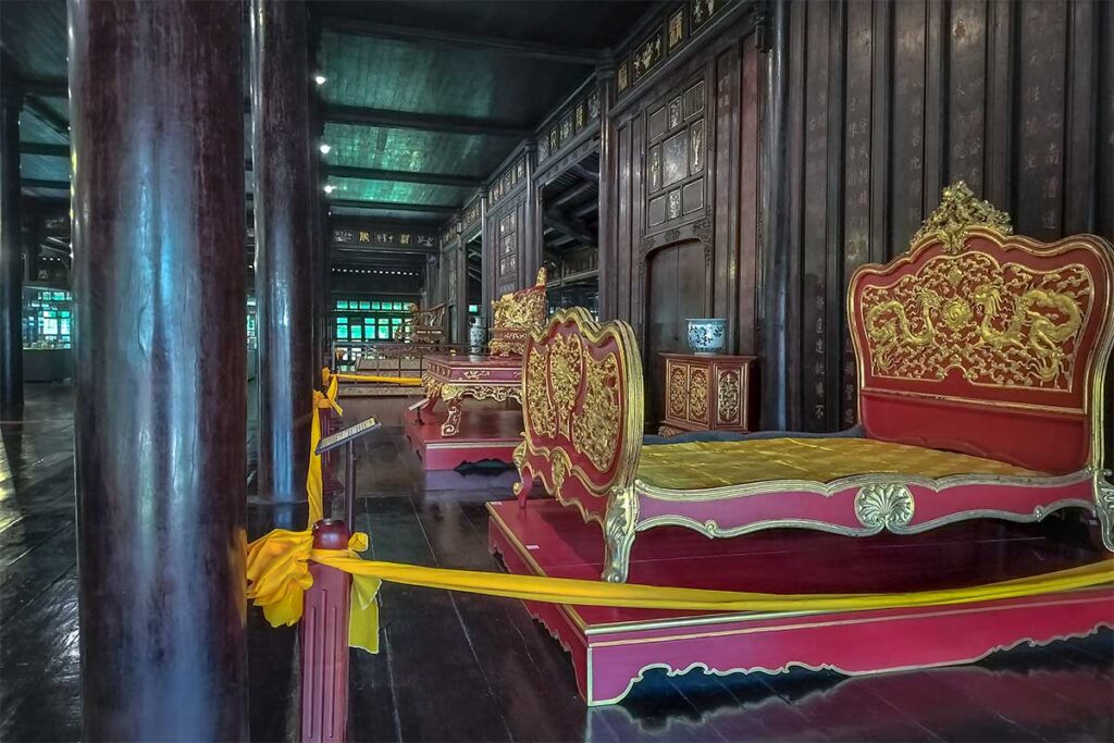 Nguyen Dynasty royal beds (giường ngự), likely from the Imperial Palace displayed at Hue Museum of Royal Antiquities